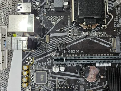 (Из ремонта, рабочий, гарантия 14 дней, OEM) Материнская плата Gigabyte H410M K 2.0, LGA 1200, Intel Q470, 2xDDR4, 2xSATA, 1xM.2, 1xPCIe 3.0 x16, 1xPCIe x1, 1xHDMI, 1x 1Gb LAN, 2xUSB-A 3.2 Gen 1, 4xUSB-A 2.0, 3x3.5 мм, 7.1, mATX